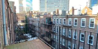 Bright  Modern 4th Floor Penthouse with Private Roof Deck – 2 Bed | 1 Bath | 840 Sq Ft Gallery 4