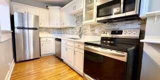 Top-Floor 2 Bedroom Condo in Gated Community with Huge Balcony  Elegant Marble Bath Gallery 1