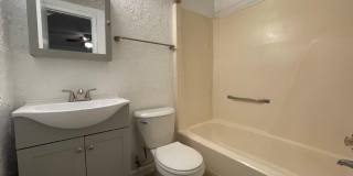 1 bed downstairs unit with courtyard, laundry access,brand new appliances, paint and flooring, includes all utilities up to 200 monthly Gallery 7