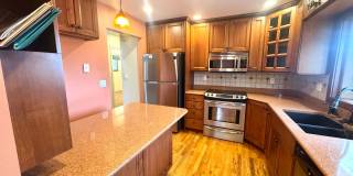 Spacious Eastside Home with Sunroom, EV Charging & Finished Basement! Gallery 1