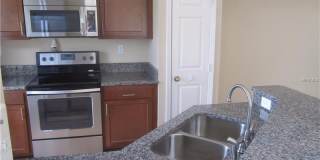 Water view condo with garage in sought after westchase Gallery 12