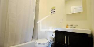 Nicely renovated Townhouse in a prime location near the Green Line with parking included! Gallery 4