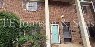 Charming 2BR Townhome with Updated Finishes & Off-Street Parking Gallery 1