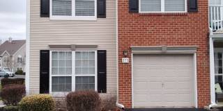 Beautifully upgraded Townhouse style condominium located in Hidden Meadows Gallery 1