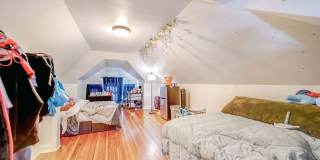 Charming 5-Bedroom Home with Exposed Brick and Modern Upgrades Gallery 45