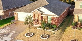 2 car garage with lighting, granite countertops. Backyard includes a custom extended concrete patio perfect for gatherings Gallery 1