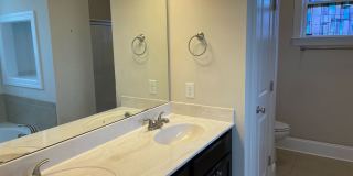 Beautiful 3 bedroom/2 bath home with sunroom and finished room over garage! Gallery 13