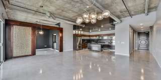 Modern Industrial Loft at Soho Lofts – 1BR/2BA High-Rise in the Arts District, City & Mountain Views! Gallery 11