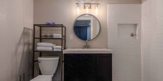 Completely remodeled like new Gingerbread midtown cottage with gleaming hardwoods, converted from a 3/1 to a 3/2. Gallery 38