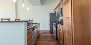 Gorgeous two bedroom two bath with 1574 ft. Two parking spaces included balcony, beautiful rooftop deck no pets. Gallery 7