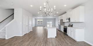Experience refined, contemporary living in this nearly new residence designed for both comfort and style. Gallery 4