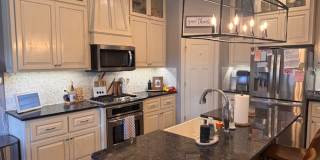 WOW! This home has it all, 3 full bathrooms, 5 true bedrooms AND a bonus room. great outdoor space, wood and ceramic tile flooring in the main living space, Open kitchen, all in a gated community! Availability is flexible on or before July 1 Gallery 5
