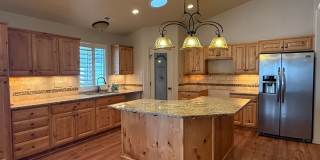 Beautiful patio home with 2 car garage, central air, fenced yard and covered patio Gallery 1