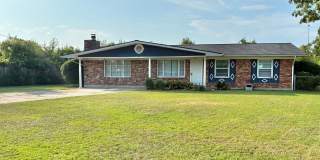 Charming 4BR/2BA Brick Home Gallery 1