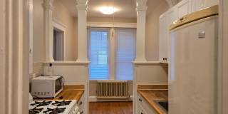 Short walk to Longwood! Steps to T! Large 1 bedroom w/Cute kitchen with eat-in alcove! (7/1) Gallery 1