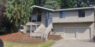 Great 4BR 2.5BA Split Entry Home in Quiet Forest Park Neighborhood Gallery 1