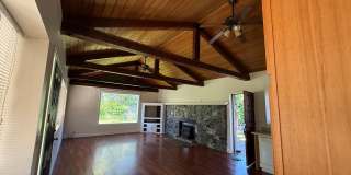Charming Auburn Retreat with Vaulted Ceilings  Stone Fireplace Gallery 1