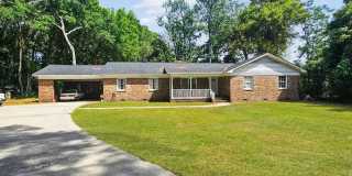 Charming brick home in beautiful Savannah offering four bedrooms and 2.5 bathrooms, Prime location! Gallery 1