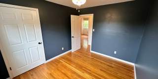 AVAILABLE NOW! Spacious 4 BR, 2 Bath House! Wood Floors, Attached Garage, W/D Included Gallery 11