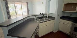 AVAILABLE NOW: First-floor 2-bedroom, 1-bath condo in Gated Community Gallery 6