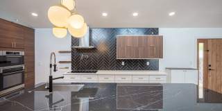 European-inspired Mid-Century Henderson Home! Gallery 42