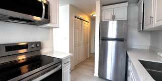 Updated 2-Bedroom Condo with Water Views, 2 Parking Spaces & Poolside Location Gallery 3