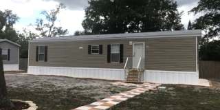 Two-bedroom Home with Water, Garbage, and Lawncare Included Gallery 1