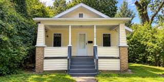 Charming 3-Bedroom Akron Home with a Covered Porch and Private Yard Charming 3-Bedroom Akron Home with a Covered Porch and Private Yard Gallery 1