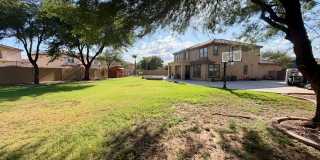 Spacious 6-bedroom, 2.5-bathroom home in Chandler, Welcome to the family friendly community of Sun Groves sitting on nearly 18,000 sq ft and one of the largest lots in the neighborhood. Gallery 44