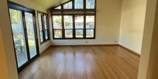 Beautiful One-Level Home with Sunroom, Vaulted Ceilings & Multiple Living Areas Gallery 12