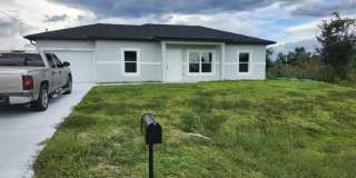 Brand-New 3BR/2BA Home with Garage in Lehigh Acres Brand-New 3BR/2BA Home with Garage in Lehigh Acres Gallery 1