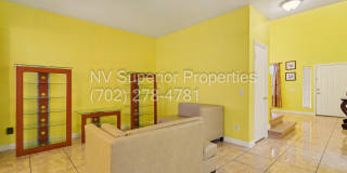 NW!! 4 Bedrooms!!! All Tile and Pergo flooring T/O!! NO Carpet!!! Low Maintenance Desert landscaping front and back!! With Patio cover in back!!! Gallery 16