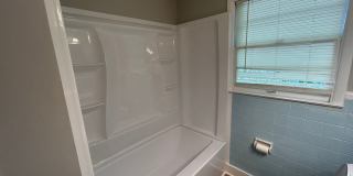 3br 2ba brick home with carport and fenced in yard. Gallery 9