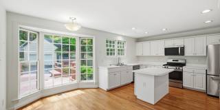 This exceptional home offers the perfect blend of timeless design, generous living space, and an unbeatable location in the heart of Lyon Park. Gallery 11