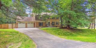 5 BR 4.5 BA home with inground heated pool and extensive hardscape! Gallery 3