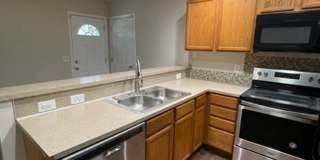 Must see this 4 bedroom 2.5 bath townhouse with 1 car garage . Gallery 8