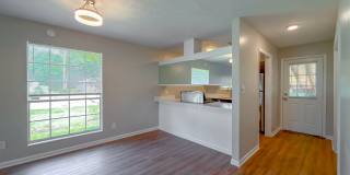 RENOVATED 2/1 w/ New Flooring/Paint, Fenced Yard, Deck, Walk In Closets, Granite Counters, & Stainless Appliances ! Avail NOW for $1295/month Gallery 6