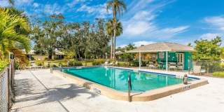 WELCOME TO THIS BEAUTIFULLY UPDATED 2 BEDROOM, 2 BATHROOM VILLA LOCATED IN THE DESIRABLE CENTER GATE COMMUNITY OF SARASOTA! Gallery 33