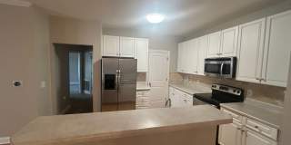 Don't miss this 4-bed, 3-bath condo TWO miles from the ocean! Gallery 6