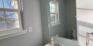 Welcome to this charming and spacious home! Gallery 13