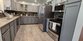 Spacious Ranch-Style 5BR Home w/ Finished Basement & Large Fenced Yard Gallery 3