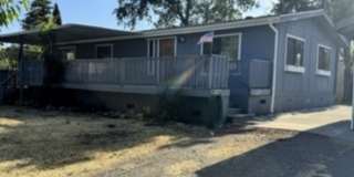 Charming 2BR/2BA Country Home with Bonus Room, Expansive Yard, & Large Decks Gallery 1