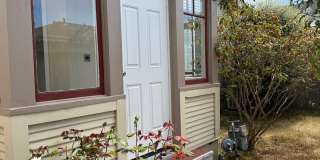 Charming 1 Bed, 1 Bath Cottage – Detached Garage + Sunroom! Gallery 1