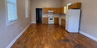 SINGLE FAMILY HOME! Mid-City 2 BR/1 BA rental with backyard. Gallery 4