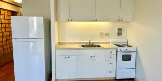 Holiday Manor studio, secured building, laminate wood flooring! Gallery 1