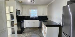 Spacious 4BR/2BA Brick Home with Fireplace, Large Island! Gallery 11