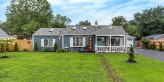 Charming Indianapolis Home with Modern Updates, Gorgeous Landscaping & 2-Car oversized garage Gallery 1