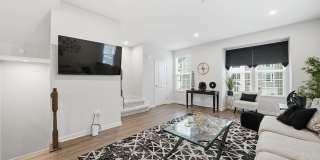 Welcome to this like new fully furnished home located in The Village at Courthouse Commons in Spotsylvania. Gallery 7