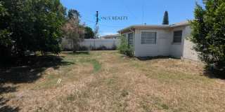 Must See 3/2/1 over 1000sf with tile/laminate floors, fresh paint, fenced yard and large living room!! Must See 3/2/1 over 1000sf with tile/laminate floors, fresh paint, fenced yard and large living room!! Gallery 17