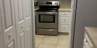Great 2/2 condo in Pershing point Lake view  with updated Flooring Gallery 5